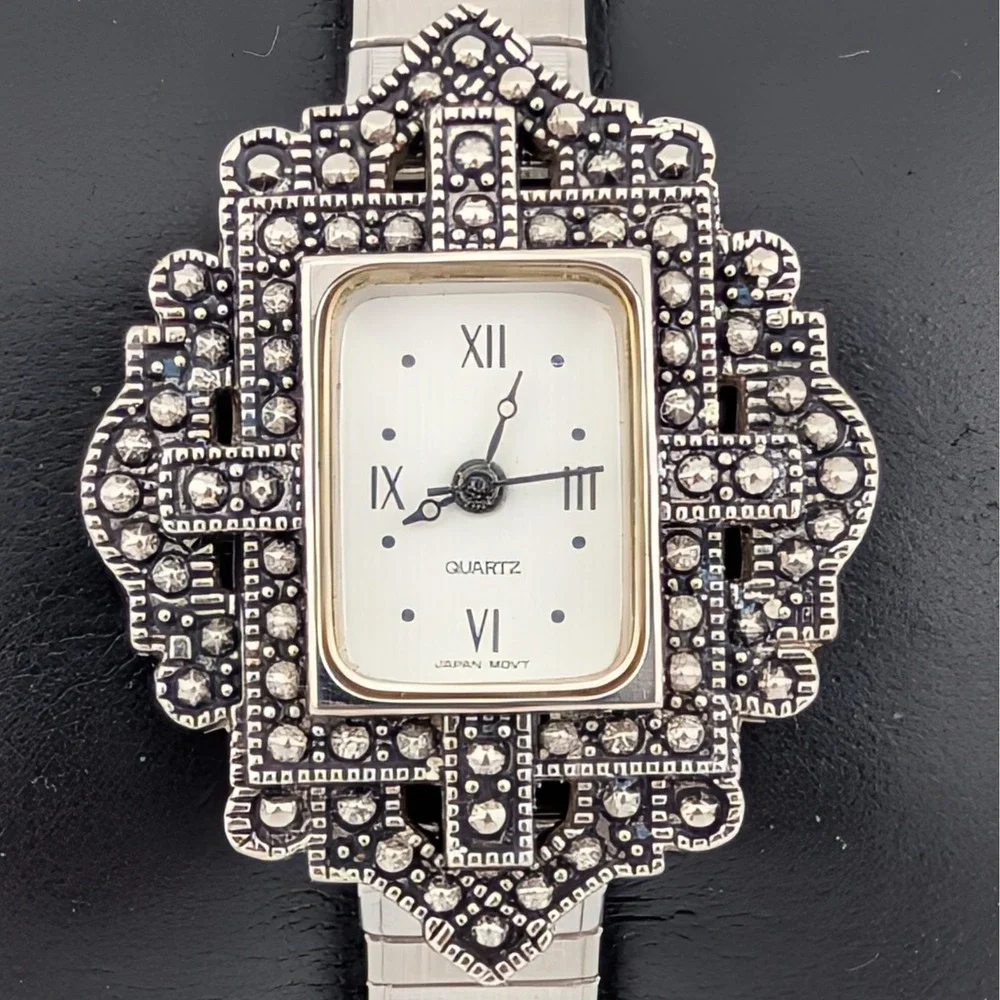 Avon silver tone